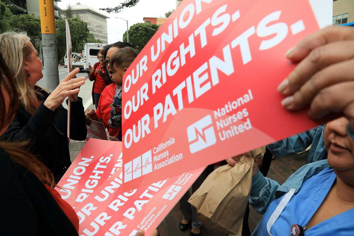 Members of the California Nurses Association protest in San Francisco on Wednesday, June 27, 2018, after a Supreme Court ruling seen as a major blow to organized labor. In a 5-4 decision, the court ruled that government workers cannot be required to pay for collective bargaining, which could cost public unions tens of millions of dollars. (Jim Wilson/The New York Times)