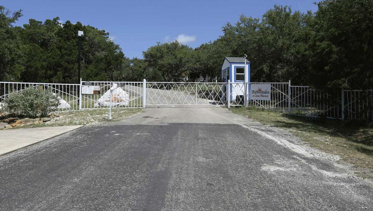 A gate marks the entrance Wednesday, June 27, 2018 to Southwest Key's Casa Blanca facility.