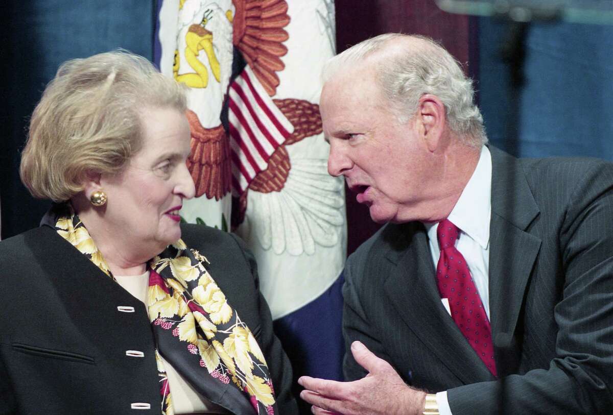 02/07/1997 - U.S. Secretary of State Madeleine Albright chats with former Secretary of State James Baker III before her speech at the Baker Institute for Public Policy at Rice University.