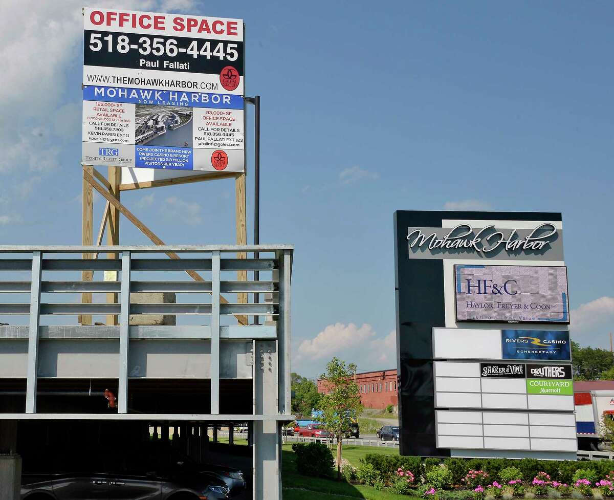 Signs outside the Mohawk Harbor complex Friday June 29, 2018 in Schenectady, NY. (John Carl D'Annibale/Times Union)