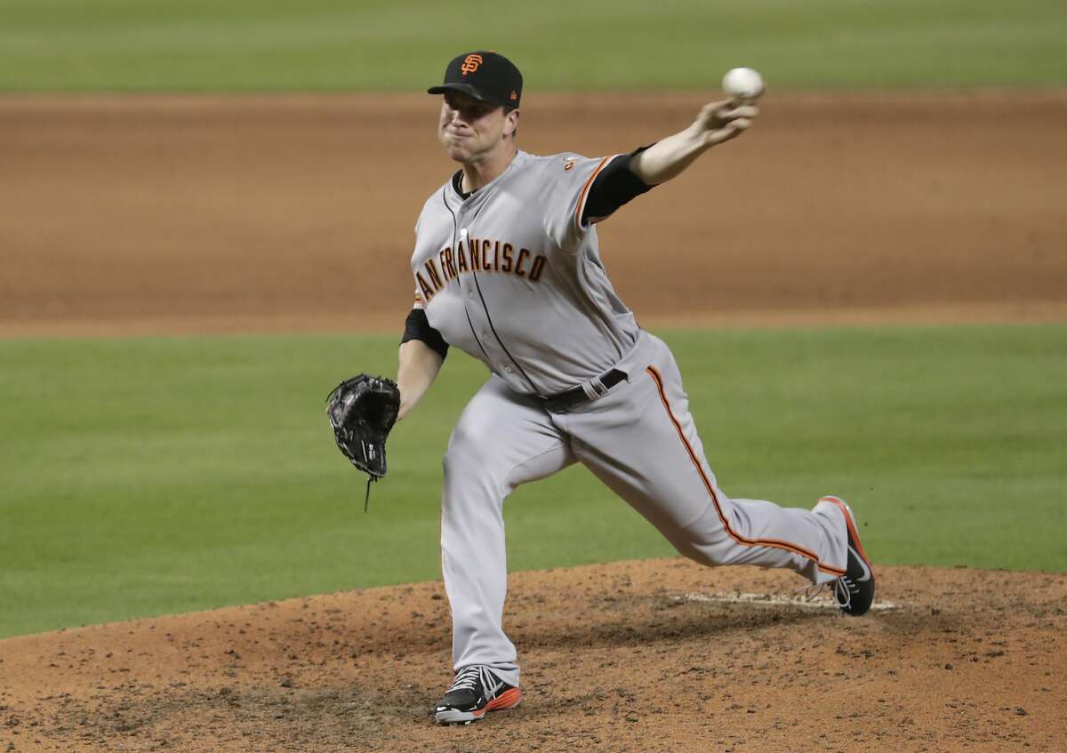 San Francisco Giants relief pitcher Tony Watson delivers during the eighth inning of a baseball game against the Miami Marlins, Thursday, June 14, 2018, in Miami. The Giants won 6-3 in sixteen innings. (AP Photo/Lynne Sladky)