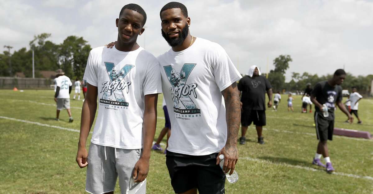 Xavien Howard and his younger brother, Keith Collins during the Xavien Howard Football Camp at Wheatley High School, Saturday, June 30, 2018, in Houston. Howard, a Wheatley grad now in the NFL and giving back to his community. ( Karen Warren / Houston Chronicle )
