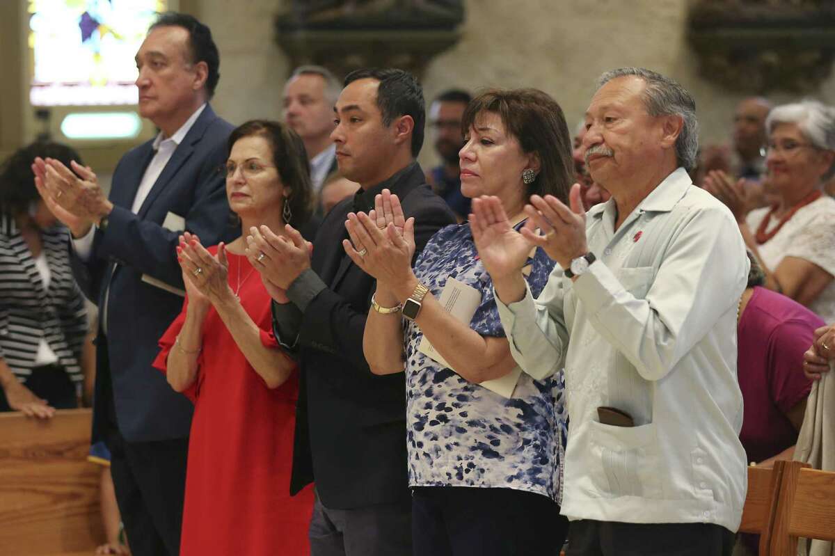 From left, former Secretary of Housing and Urban Development under President Bill Clinton, Henry Cisneros, his wife and former San Antonio City Council member Mary Alice Cisneros, U.S. Congressman Joaquin Castro, Sonia Rodriguez and her husband, United Farm Workers of American President Arturo Rodriguez, attend a Mass in honor of American labor leader and civil rights activist Cesar Chavez, at San Fernando Cathedral, Sunday, July 1, 2018. San Antonio Archbishop Gustavo Garcia-Siller offered a prayer for migrants and refugees was offered at the end of the service.