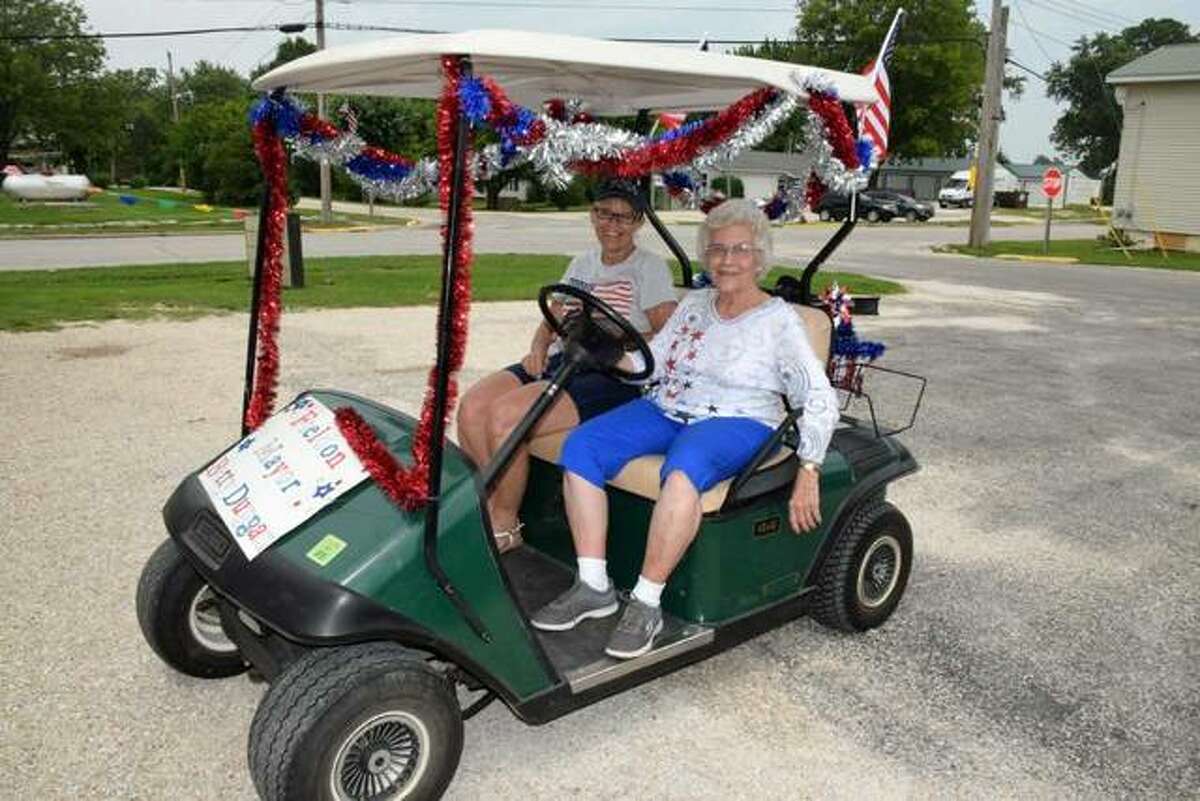 Fieldon Mayor Betty Duggan, right, and her daughter Darlene Schannot prepare to lead the community’s Independence Celebration parade on Sunday.