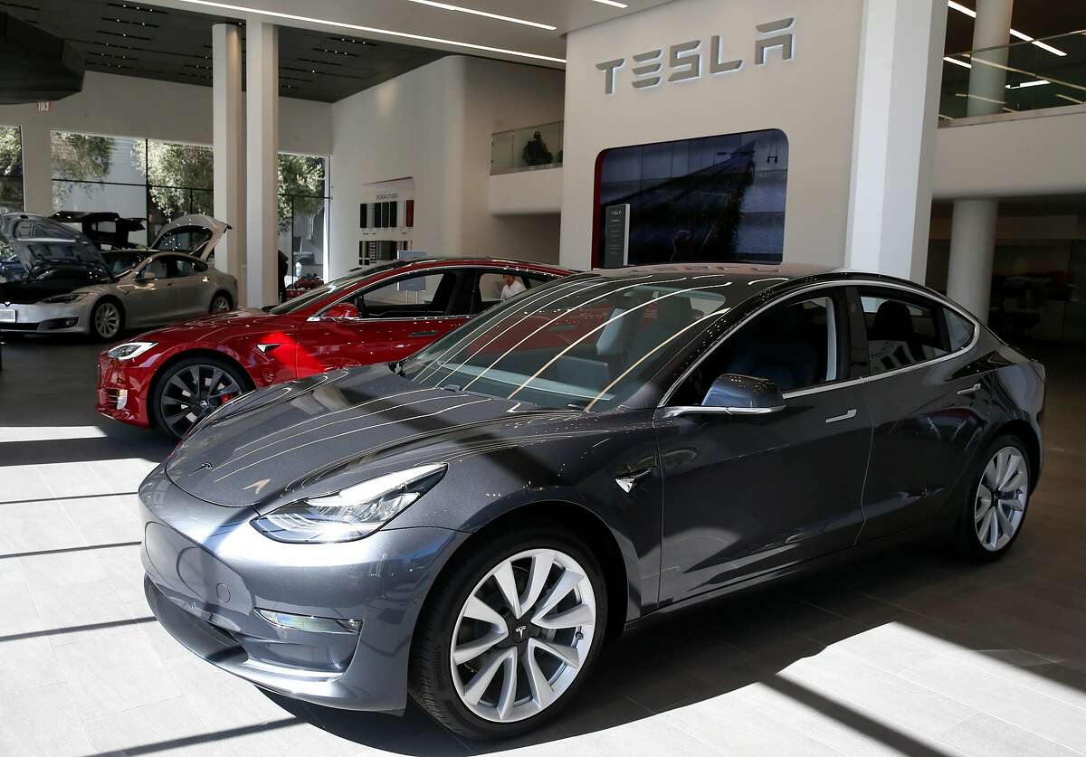 A Model 3 is displayed at the Tesla store in San Francisco, Calif. on Thursday, June 28, 2018.