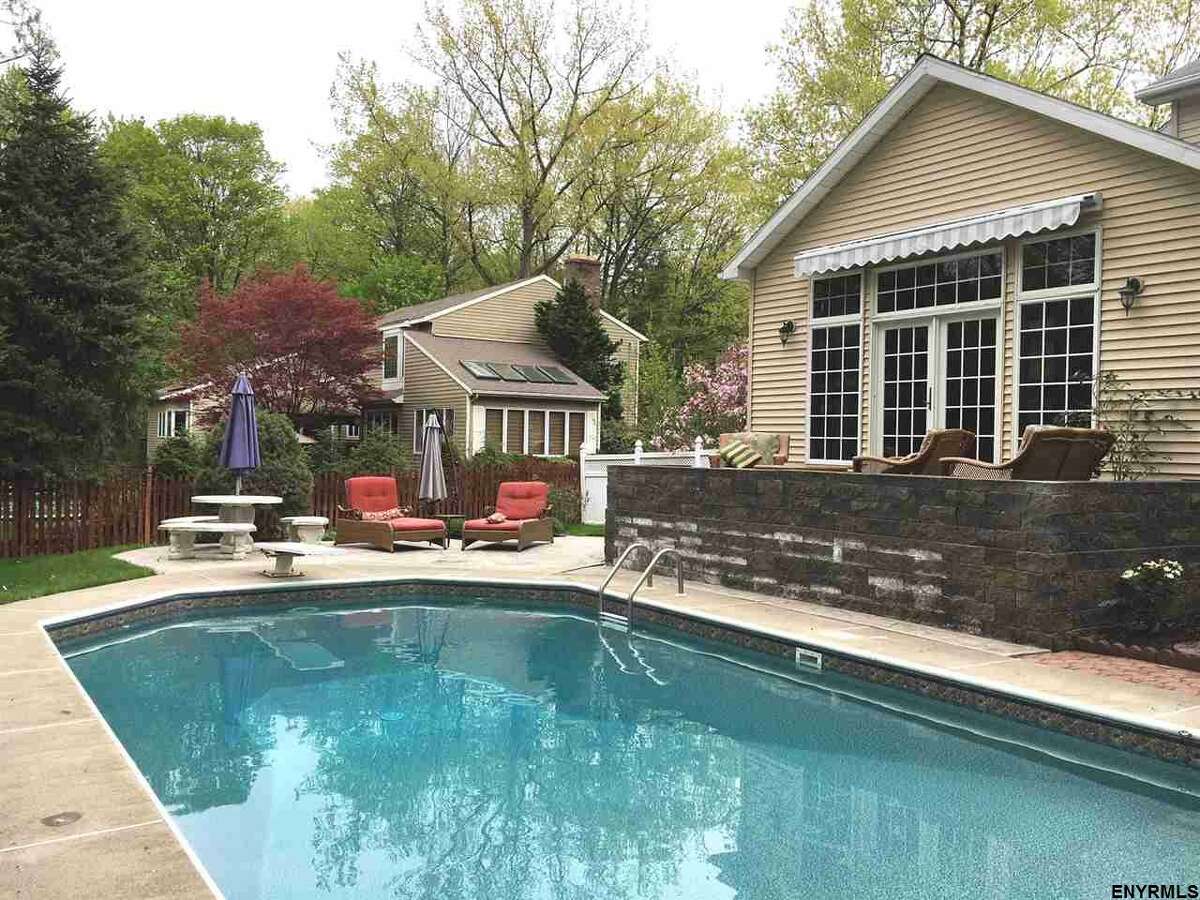 Hot enough for you? Click through the slideshow to view photos of a few area homes for sale with pools.