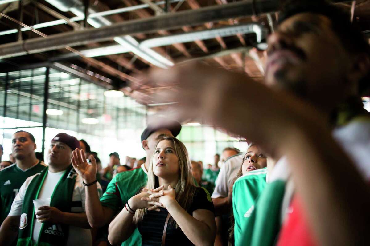 Lucero Zamezquita watches the match between Mexico and Brazil anxiously at Pitch 25, Monday, July 2, 2018, in Houston.