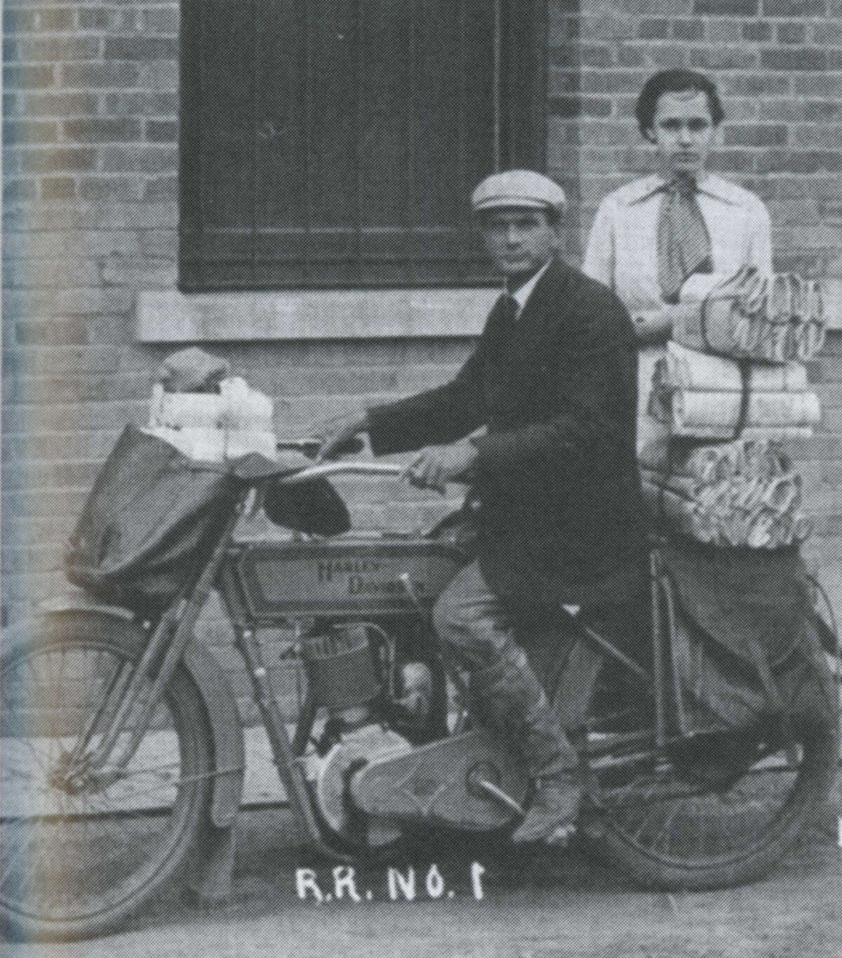 During the early 1900s, A.J. Chambers was Rural Route 1 mail carrier for the Plainview Post Office. He usually used a side car with his Harley Davidson motorcycle to carry the extra mail. When it was cold or muddy, Chambers used a horse and buggy to deliver mail along his rural route. He is shown with his daughter, Abbie Chambers, in the photo from about 1911 which was provided by members of his family. Chambers was on vacation from the post office with his wife and an all-girls church quartet when their auto caught in a flash flood outside Carlsbad, New Mexico. Chambers and two of the girls, including his 17-year-old daughter Eunice, drowned. Chamber’s wife and the other two girls were pulled from the raging torrent and survived.