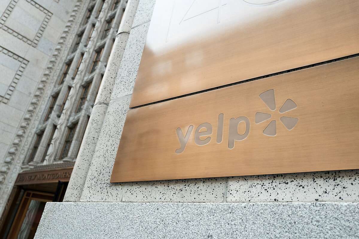 Sign at the headquarters of social reviews site Yelp in the South of Market (SoMa) neighborhood of San Francisco, California, October 13, 2017. SoMa is known for having one of the highest concentrations of technology companies and startups of any region w