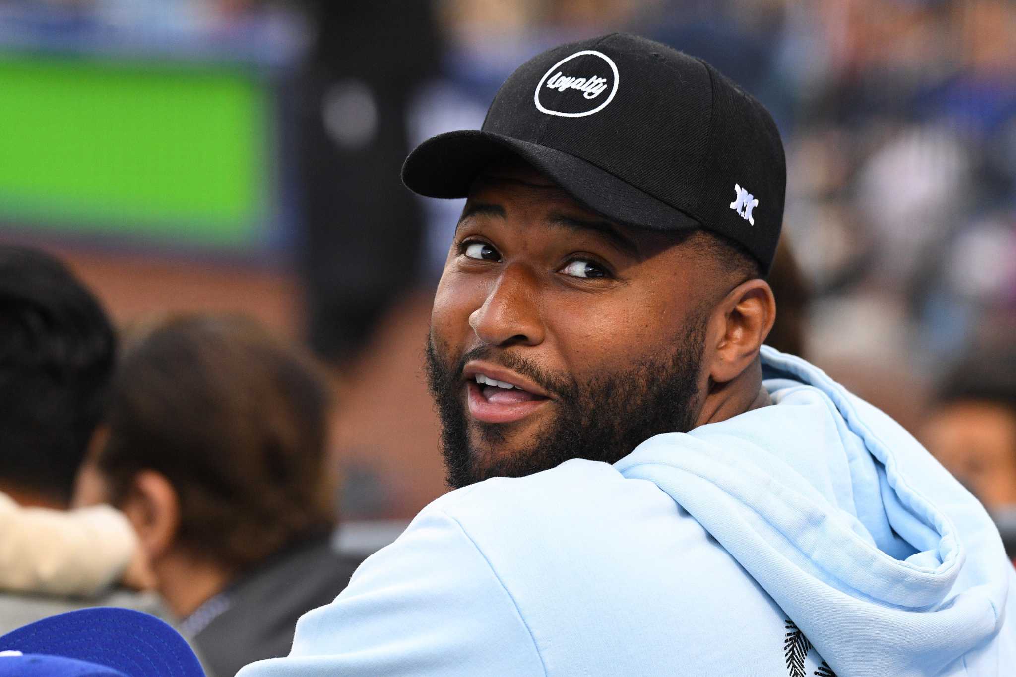 See the moment DeMarcus Cousins found out he was signing with the Warriors