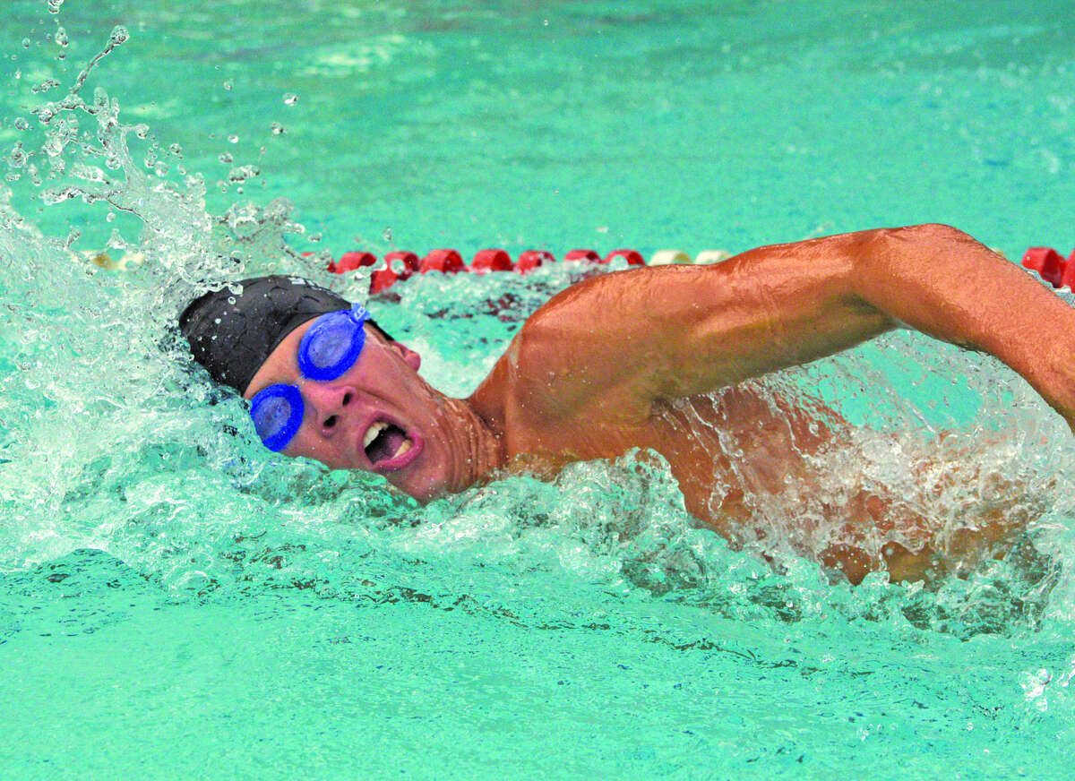 Henry Gruben of Sunset Hills competes in the boys’ 15-18 100-meter freestyle during Monday’s dual meet at Paddlers in Granite City,