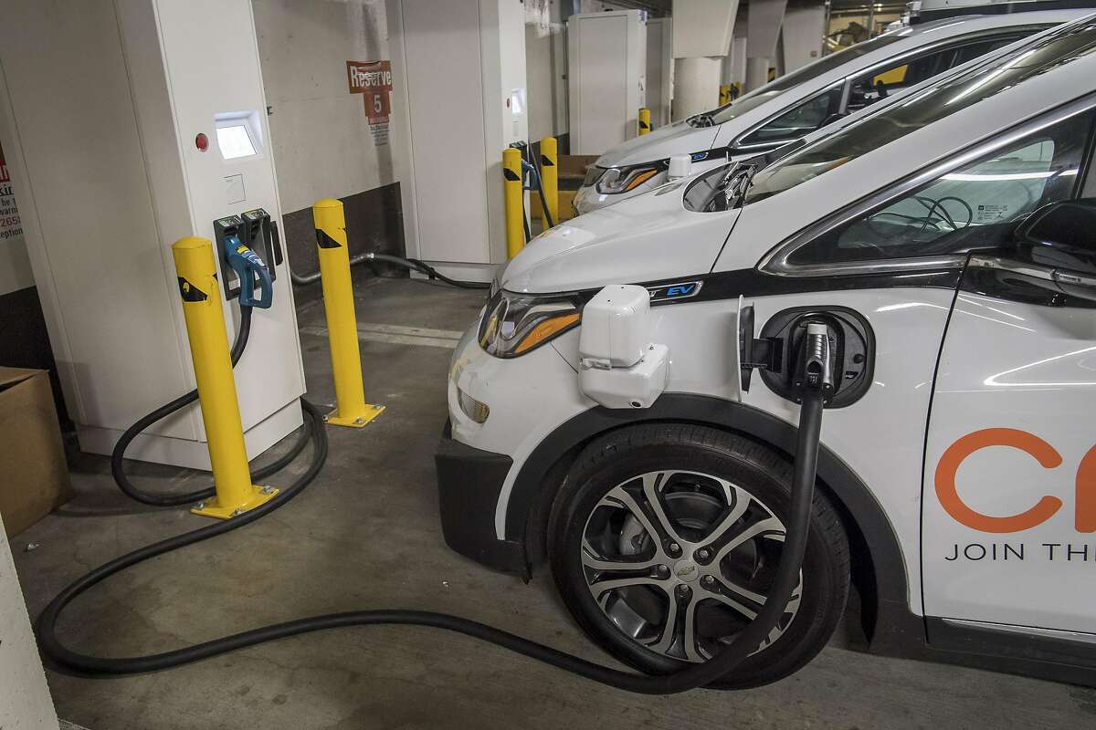 A General Motors Co. Cruise autonomous test vehicle is parked at a new charging station in San Francisco, California, U.S., on Monday, July 2, 2018. Cruise has installed 18 fast chargers in a parking facility on San Francisco's Embarcadero, a busy boulevard along the city's eastern shoreline where Uber Technologies Inc and Lyft Inc. have busy drivers.�Photographer: David Paul Morris/Bloomberg