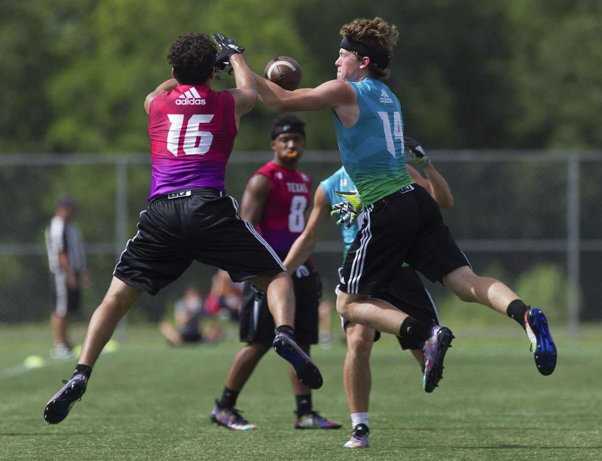 The Woodlands’ Carter Doucet (14) breaks up a pass during a game at the 7-on-7 state tournament at Veterans Park and Athletic Complex on Saturday in College Station.