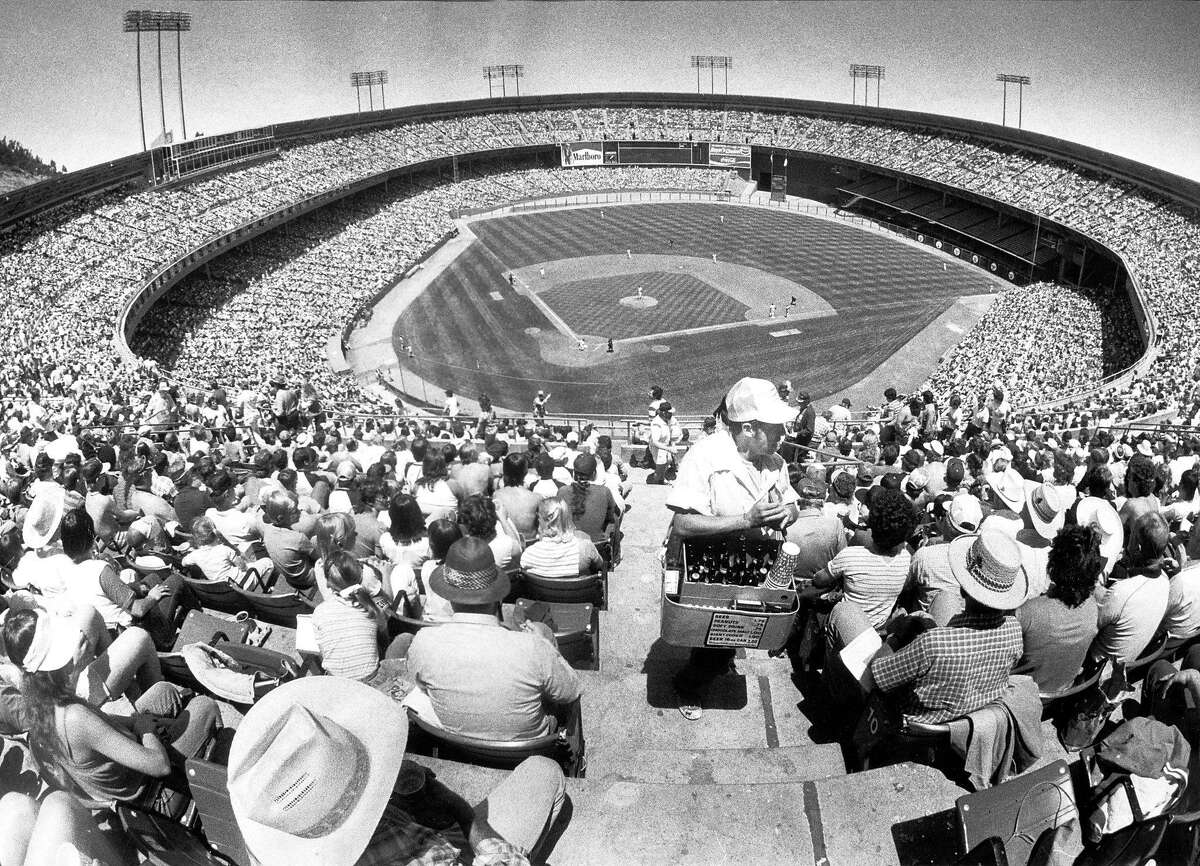June 19, 1983: These were the best days at Candlestick Park. The team wasn't very good, but the sun was out, the stands were packed and beer cost $1.75. The Giants are playing the Atlanta Braves in this photo by Fred Larson. The announced attendance for this game was 50,230 - then the largest baseball crowd in San Francisco history.