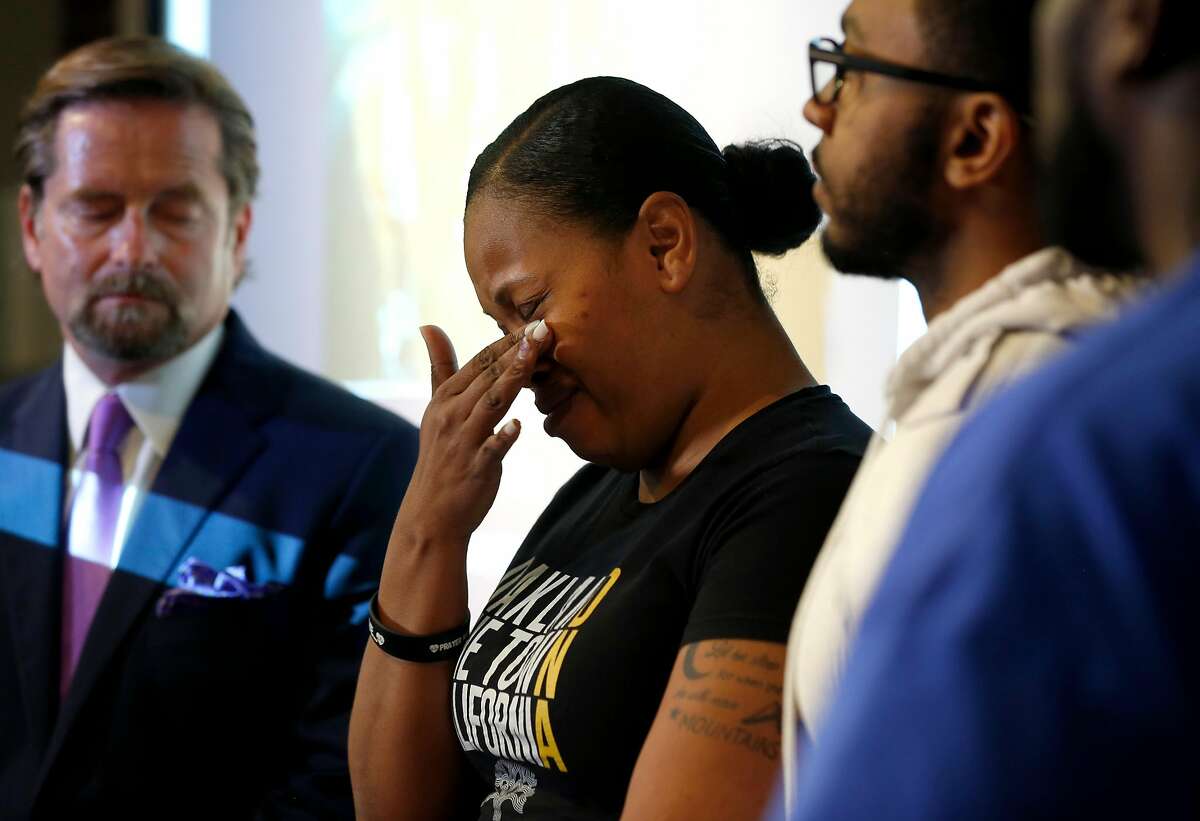 Nailah Winkfield appears at a news conference with her attorney Christopher Dolan (left), her brother Omari Sealey and husband Marvin Winkfield to discuss the death of her daughter Jahi McMath in San Francisco, Calif. on Tuesday, July 3, 2018.