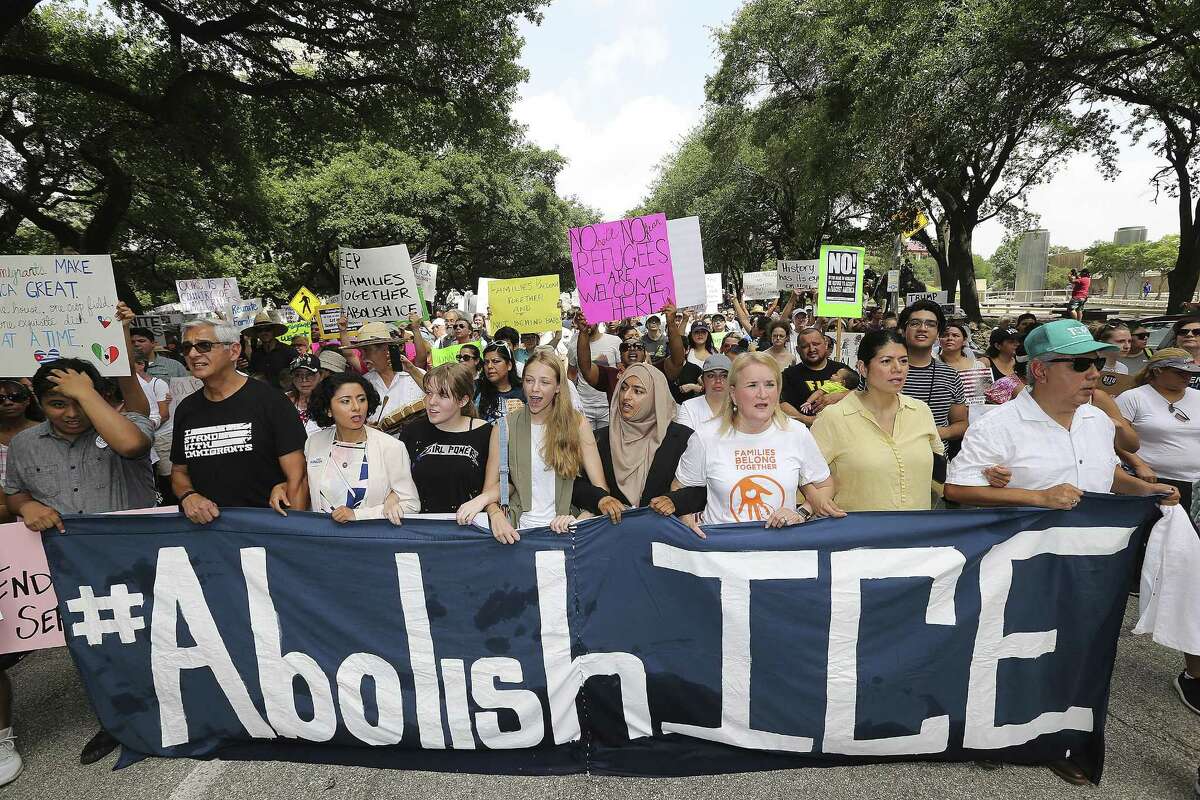 Protestors line up to march during an immigration rally in Houston on Saturday, June 30, 2018 in Houston. Rallies were held across the nation calling on federal agencies to reunite families separated at the border under Trump's "zero tolerance" policy, as well as calling for the abolishment of ICE.