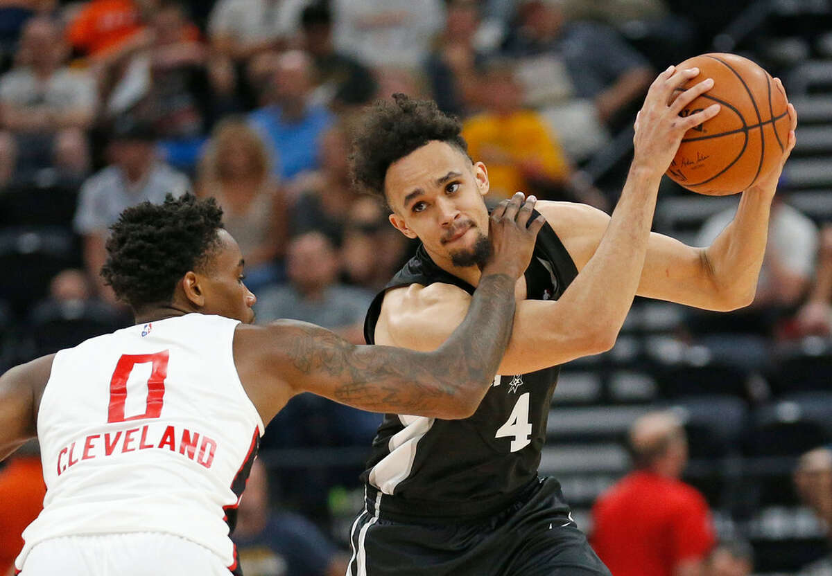 Atlanta Hawks guard Antonius Cleveland (0) guards San Antonio Spurs guard Derrick White (4) during the second half of an NBA summer league basketball game Tuesday, July 3, 2018, in Salt Lake City. (AP Photo/Rick Bowmer)