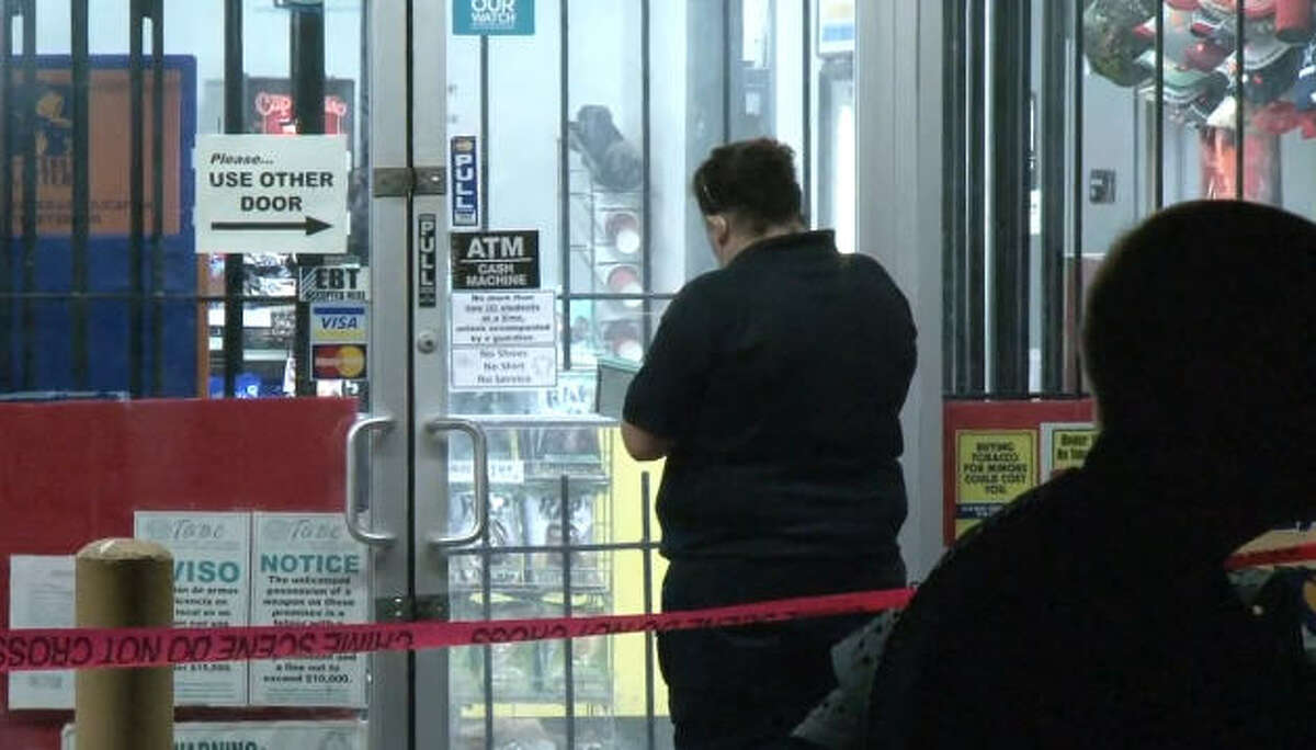 Masked shooter at large after killing clerk in botched Houston store ...