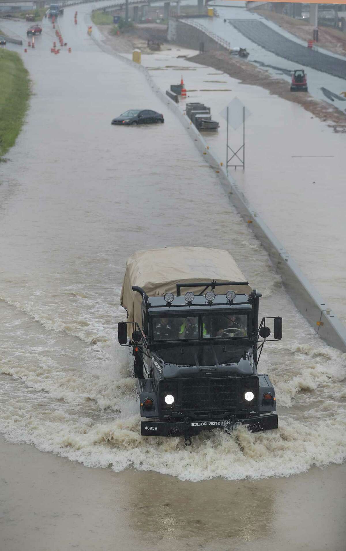 Quick-rising water sparks flash flooding in Houston on soggy Fourth of July