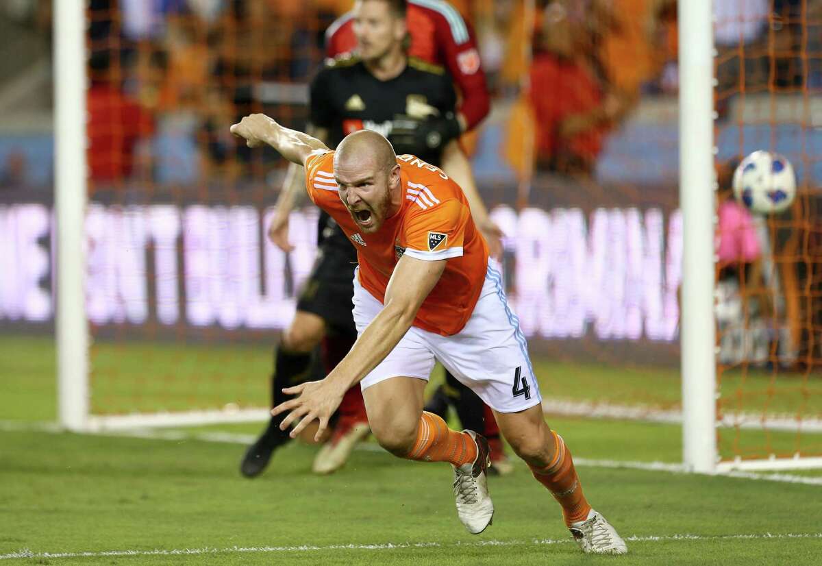 Houston Dynamo defender Philippe Senderos (4) celebrates after scoring a tying goal against the Los Angeles FC during the second half of an MLS game at BBVA Compass Stadium Tuesday, July 3, 2018, in Houston. The game ended 2-2. ( Godofredo A. Vasquez / Houston Chronicle )