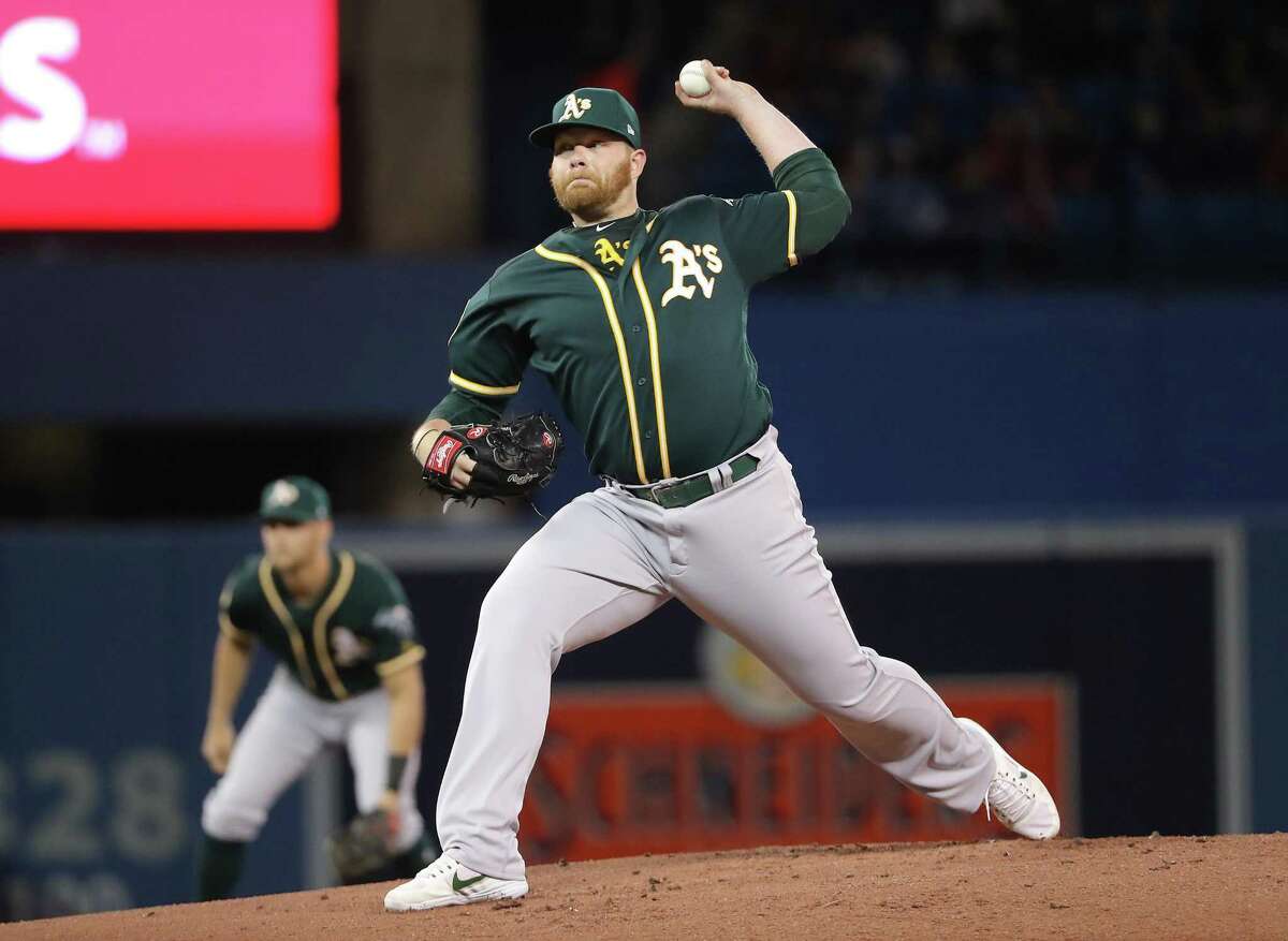 TORONTO, ON - MAY 18: Brett Anderson #30 of the Oakland Athletics delivers a pitch in the first inning during MLB game action against the Toronto Blue Jays at Rogers Centre on May 18, 2018 in Toronto, Canada. (Photo by Tom Szczerbowski/Getty Images)