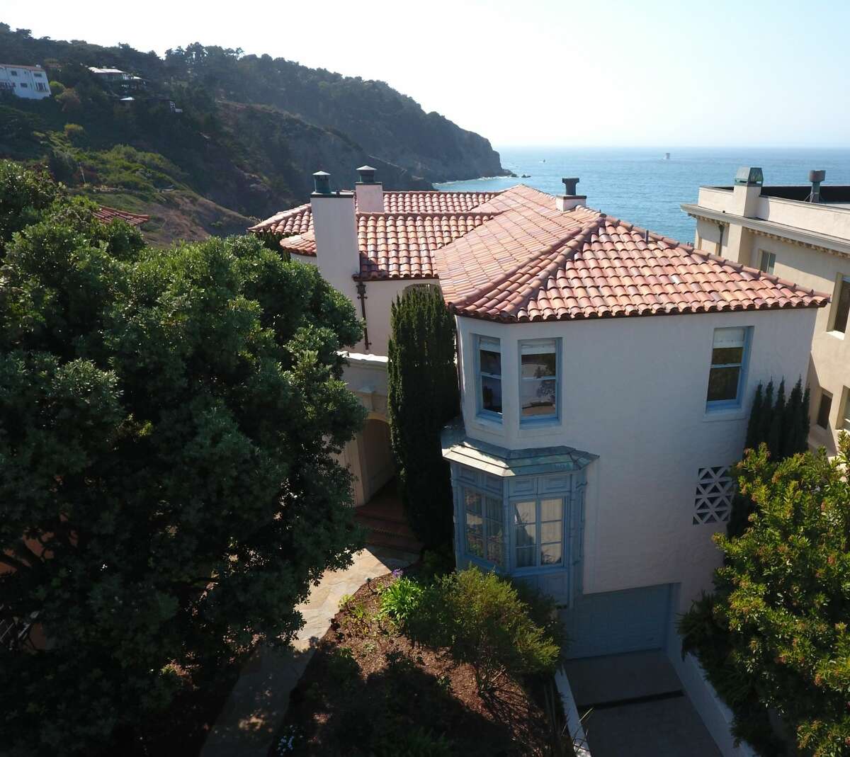 This elegant 1926 Spanish Colonial at 320 Sea Cliff Ave. overlooks China Beach and the ocean.
