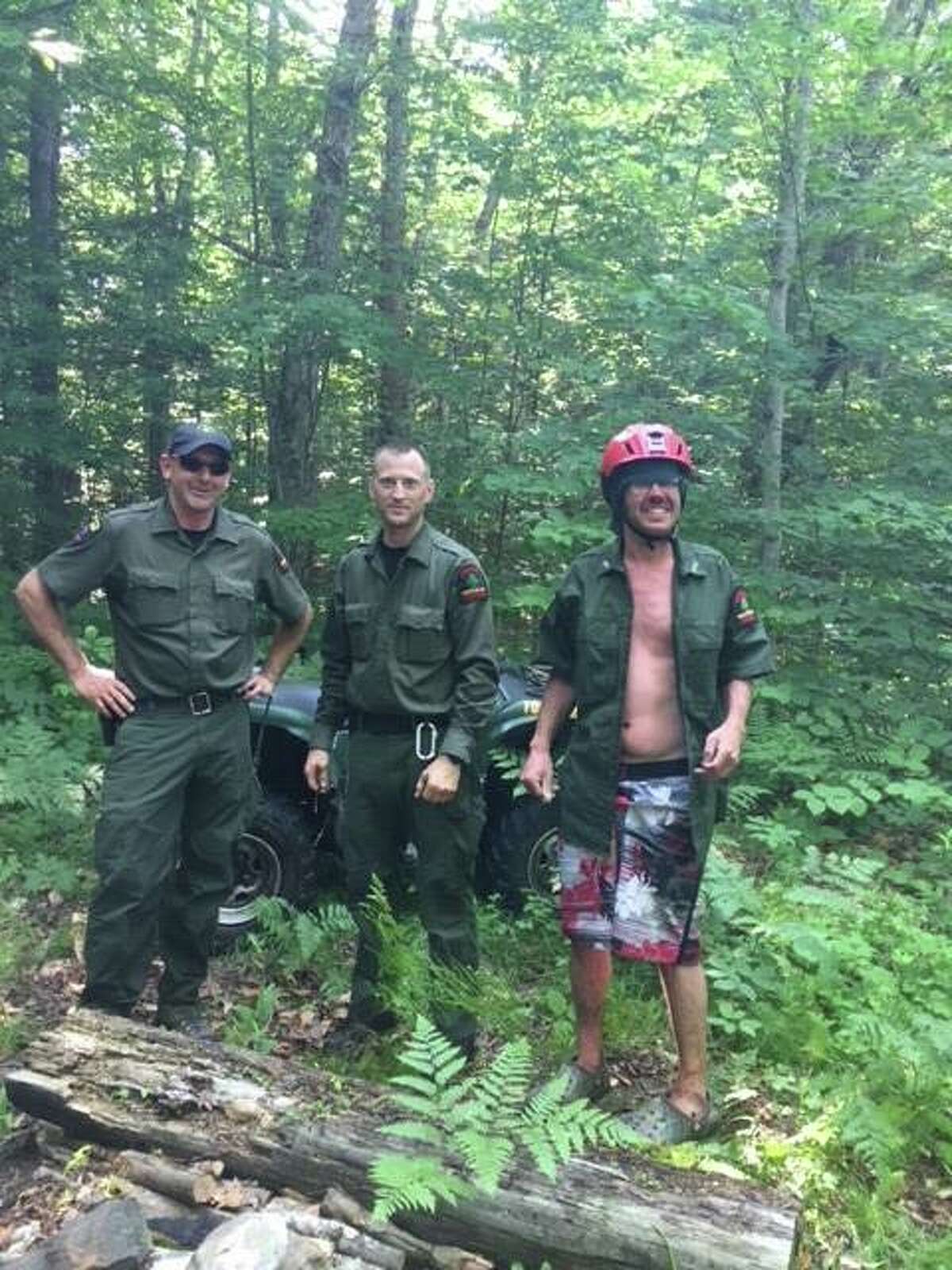 State Department of Environmental Conservation rangers Jay Scott, Evan Donegan, Ian Kerr and Gary Miller joined dozens who helped to find lost hiker Bruce Williams on Monday, July 2, 2018, on Chase Lake in the town of Bleecker, Fulton County. (NYS Department of Environmental Conservation via Facebook)