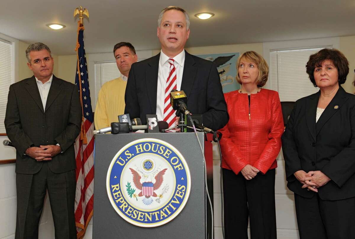 Nassau Town Supervisor David Fleming discusses issues involving the Dewey Loeffel Landfill during a press conference at the Nassau Town Hall on Tuesday, Dec. 17, 2013 in Nassau, N.Y. Standing behind him, from left, is Assemblyman Steve McLaughlin, Congressman Chris Gibson, County Executive Kathy Jimino and Senator Kathy Marchione. (Lori Van Buren / Times Union)