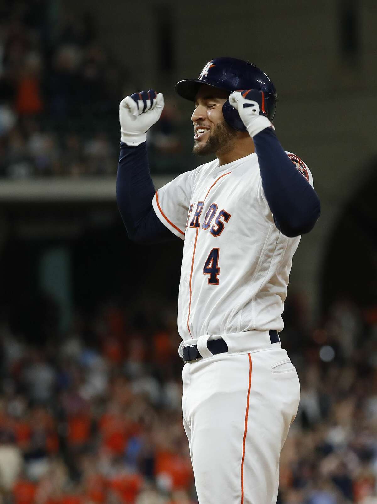 Houston Astros George Springer (4) reacts after hitting his RBI single to tie the game during the ninth inning of an MLB game at Minute Maid Park, Thursday, July 5, 2018, in Houston. ( Karen Warren / Houston Chronicle )