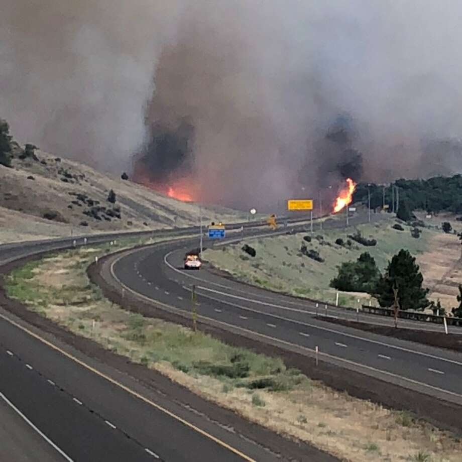   The Oregon Transportation Department posted this photo of the Klamathon fire burning both sides of the I-5 interchange south of Hilt on Thursday, July 5th. Photo: Twitter / @OregonDOT 