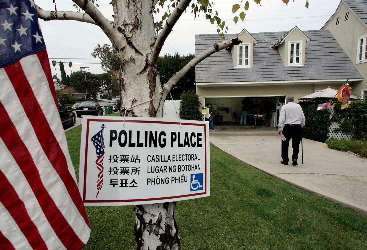 Richard Seaver walks to his polling place to cast his vote in the California special election Tuesday, Nov. 8, 2005, in Los Angeles. California voters go went to the polls Tuesday to decide the fate of Gov. Arnold Schwarzenegger's ballot proposals. (AP Photo/Nick Ut)