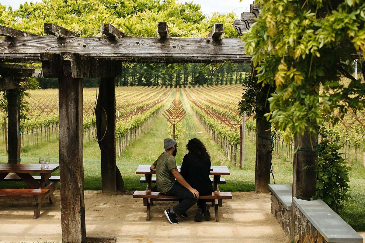 Is there anywhere you’d rather be with a glass of Gewurtz? Here, Travis Montemayor and Sara Villeda at Navarro Vineyards in Anderson Valley.