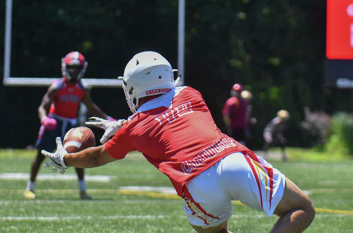 Tysen Comizio of the Greenwich Cardinals makes a catch during the 11th Annual Grip It and Rip It competition on Saturday July 7, 2018 at New Canaan High School in New Canaan, Connecticut.