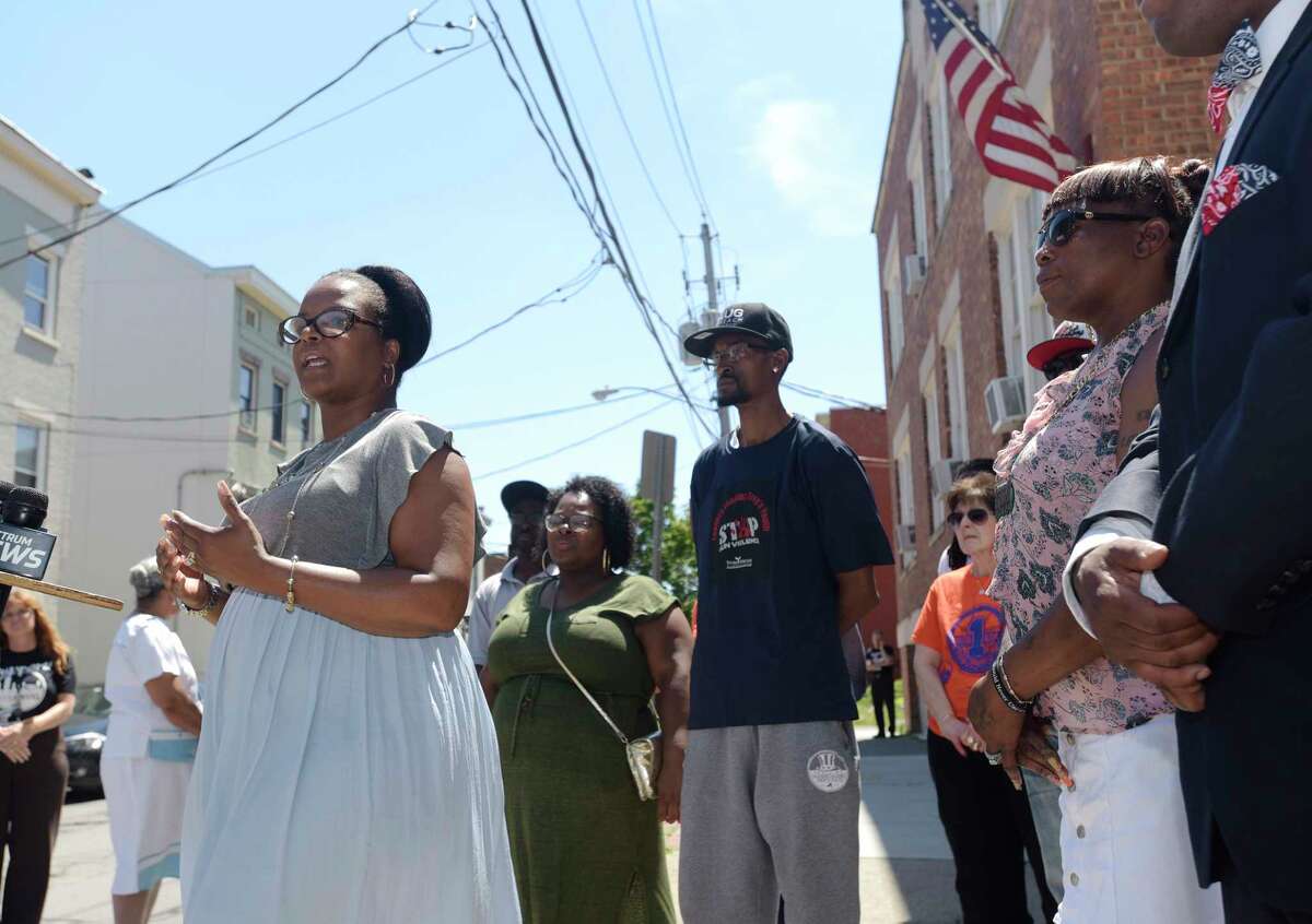 Lisa Good, the founder Urban Grief, a victim's outreach program, talks about shootings in the city of Albany, N.Y., during a press conference outside of Trinity Alliance on Sunday, July 8, 2018. (Paul Buckowski/Times Union)