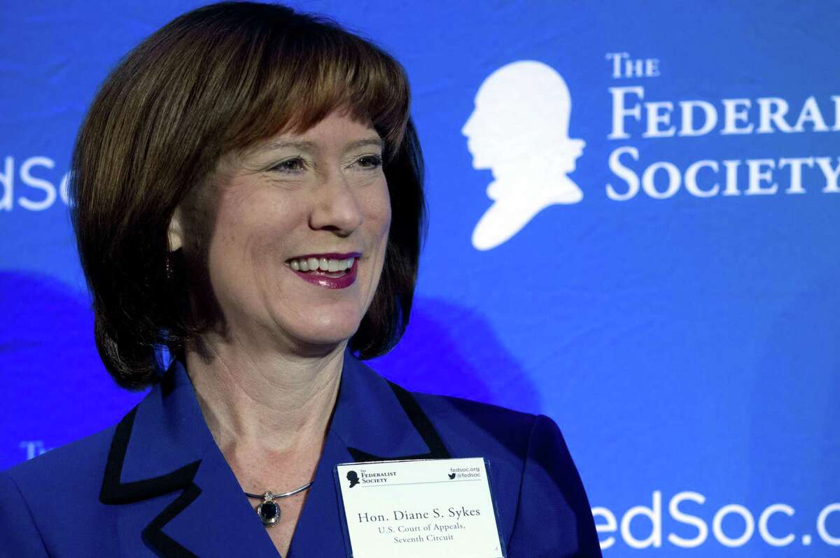 U.S. Court of Appeals, Seventh Circuit, Judge Diane Sykes speaks in a discussion during the Federalist Society's National Lawyers Convention in Washington. President Donald Trump's list of candidates for the Supreme Court, posted on White House website in November 2017 includes Sykes ( AP Photo/Jose Luis Magana, File)