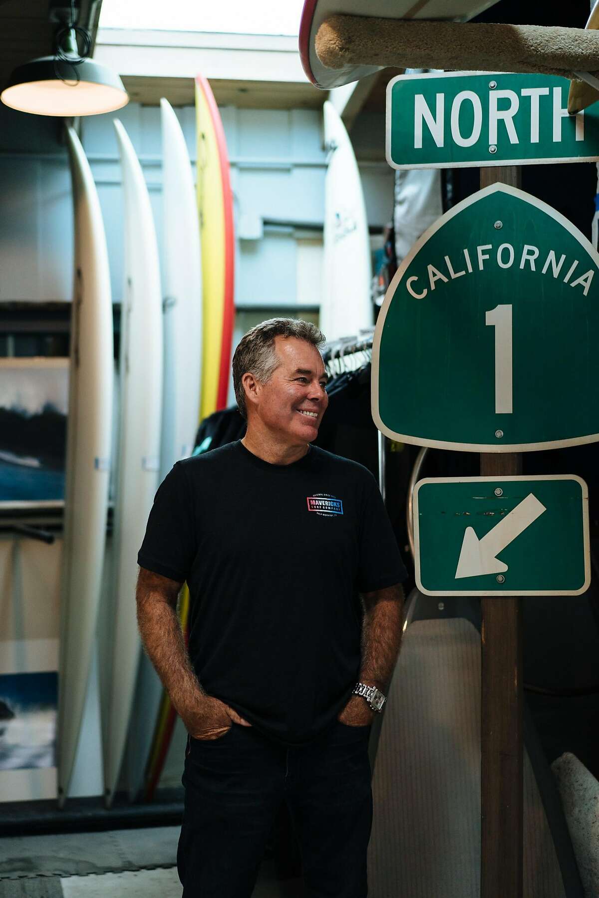 Jeff Clark poses for a portrait at his store Mavericks Surf Shop in Half Moon Bay, Calif., on Sunday, July 1, 2018