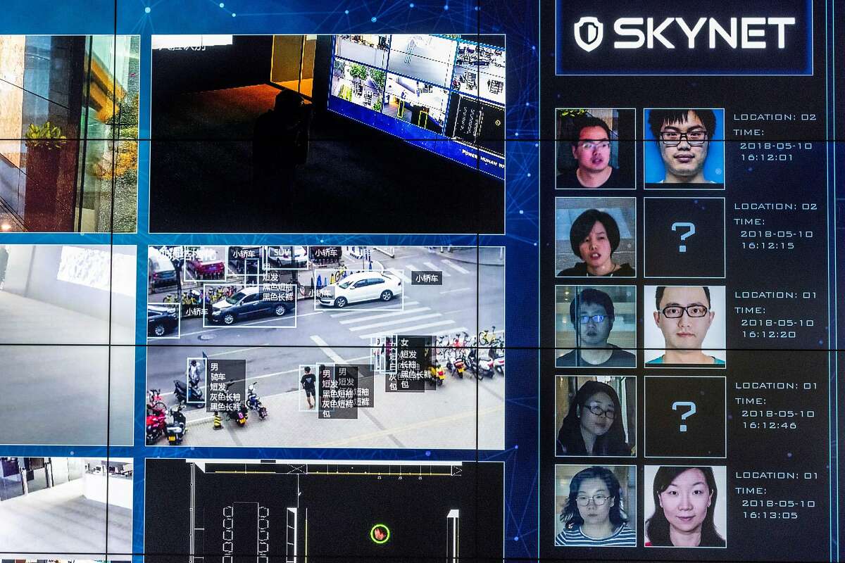 Monitors show facial recognition software in use at the headquarters of the artificial intelligence company Megvii, in Beijing, May 10, 2018. Beijing is putting billions of dollars behind facial recognition and other technologies to track and control its citizens. (Gilles Sabri�/The New York Times)