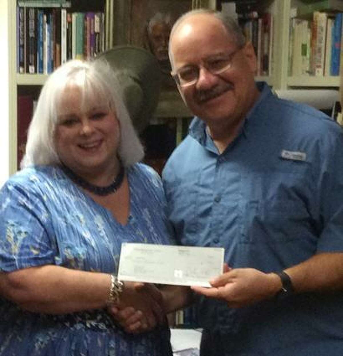 Kingsland Baptist Church is among the sponsors of Operation Back 2 School this year. Rhonda Player, Compassion Katy director of marketing, received a sponsorship check from Missions Pastor Omar Garcia.
