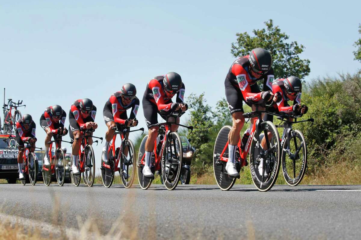 BMC Racing Team strains during the third stage of the Tour de France cycling race, a team time trial over 35.5 kilometers (22 miles) with start and finish in Cholet, France, Monday, July 9, 2018. (AP Photo/Christophe Ena)