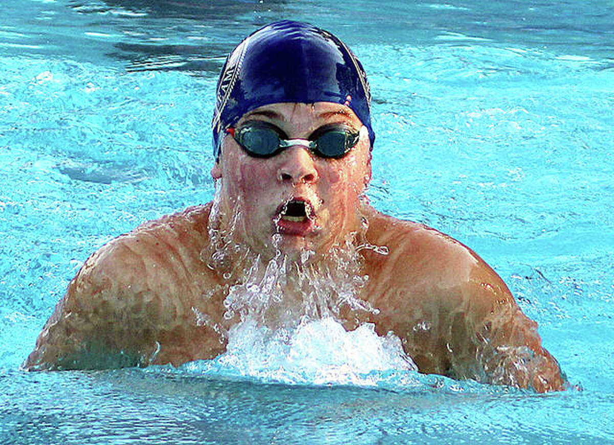 Cohen Osborn of Water Works competes in the breaststroke portion of the 13-14 boys 200-yard medley relay Monday night at Summers Port pool in Godfrey.