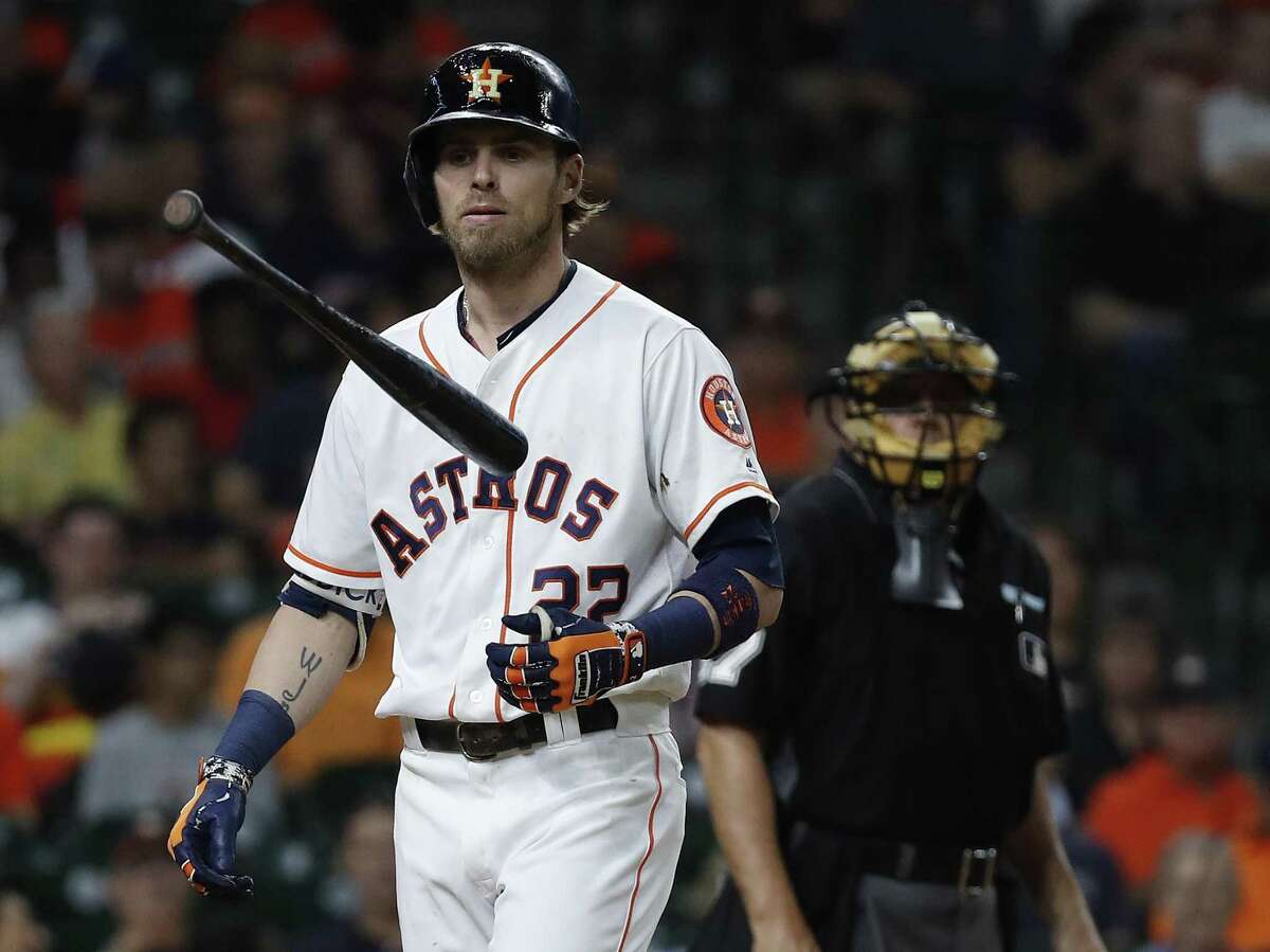 On a night the Astros came up empty, Josh Reddick heads back to the dugout after striking out in the seventh inning.