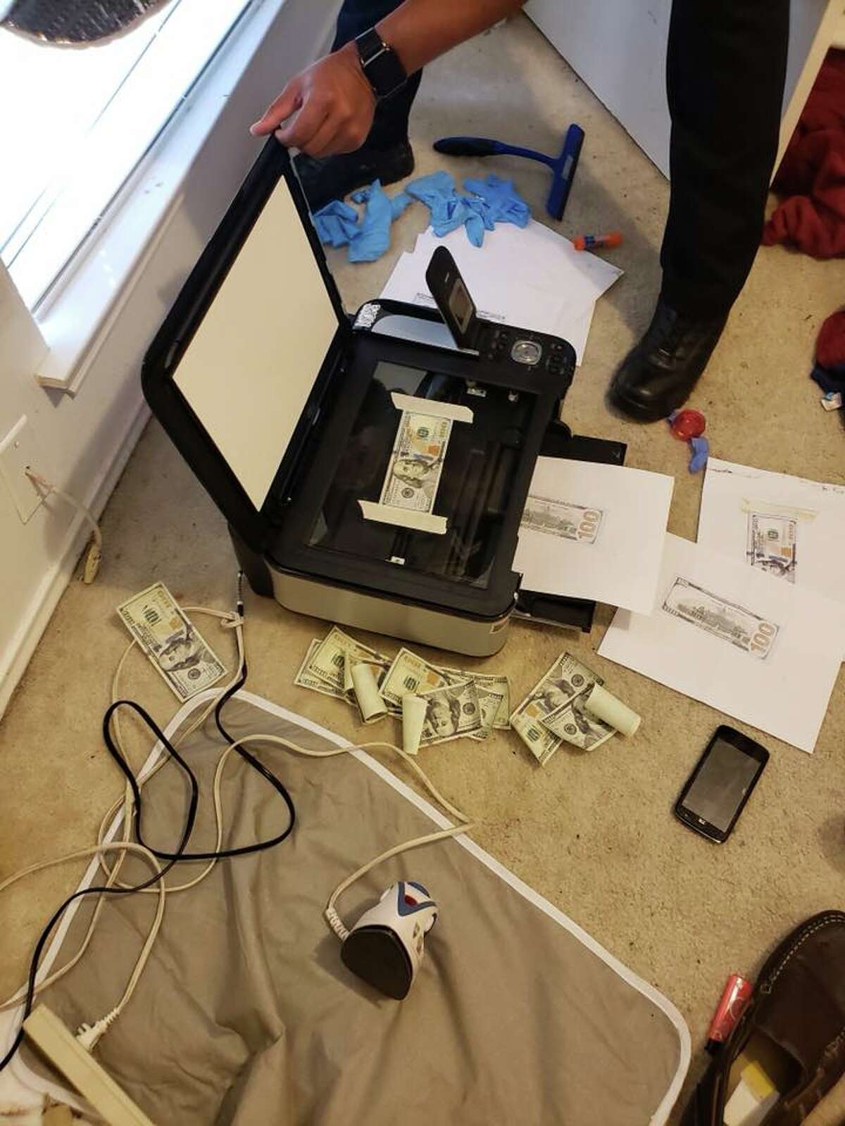 San Antonio police seized $1,000 in counterfeit cash and narcotics from a Northeast Side home on July 9, 2018.