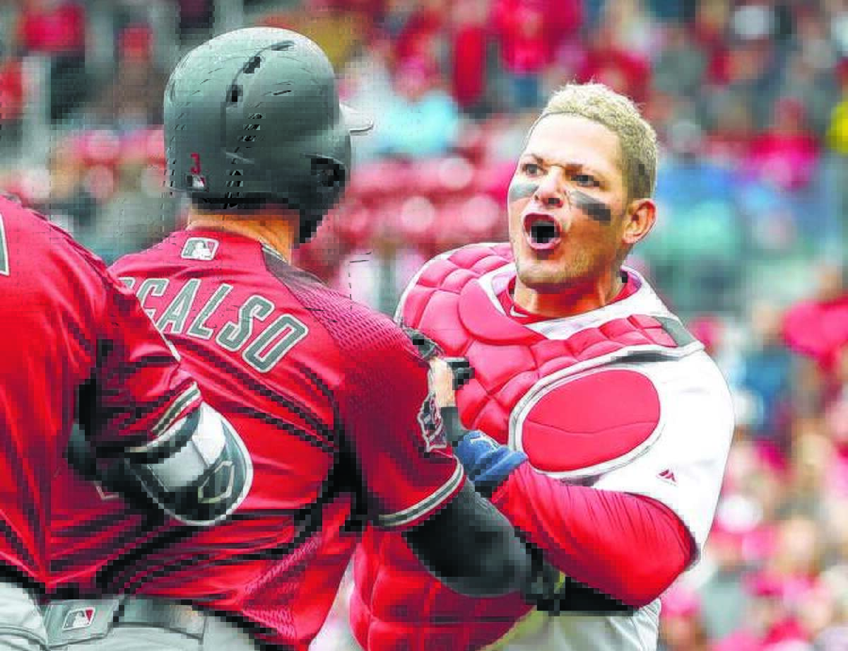 Cardinals catcher Yadier Molina, right, has been named to the National League All-Star team, replacing the Giants’ Buster Posey, who will miss the game because of hip surgery. It is Molina’s ninth All-Star Game selection. He is shown in action ealrier this season during an altercation with Arizona Diamondbacks manager Torey Lovullo (not pictured).
