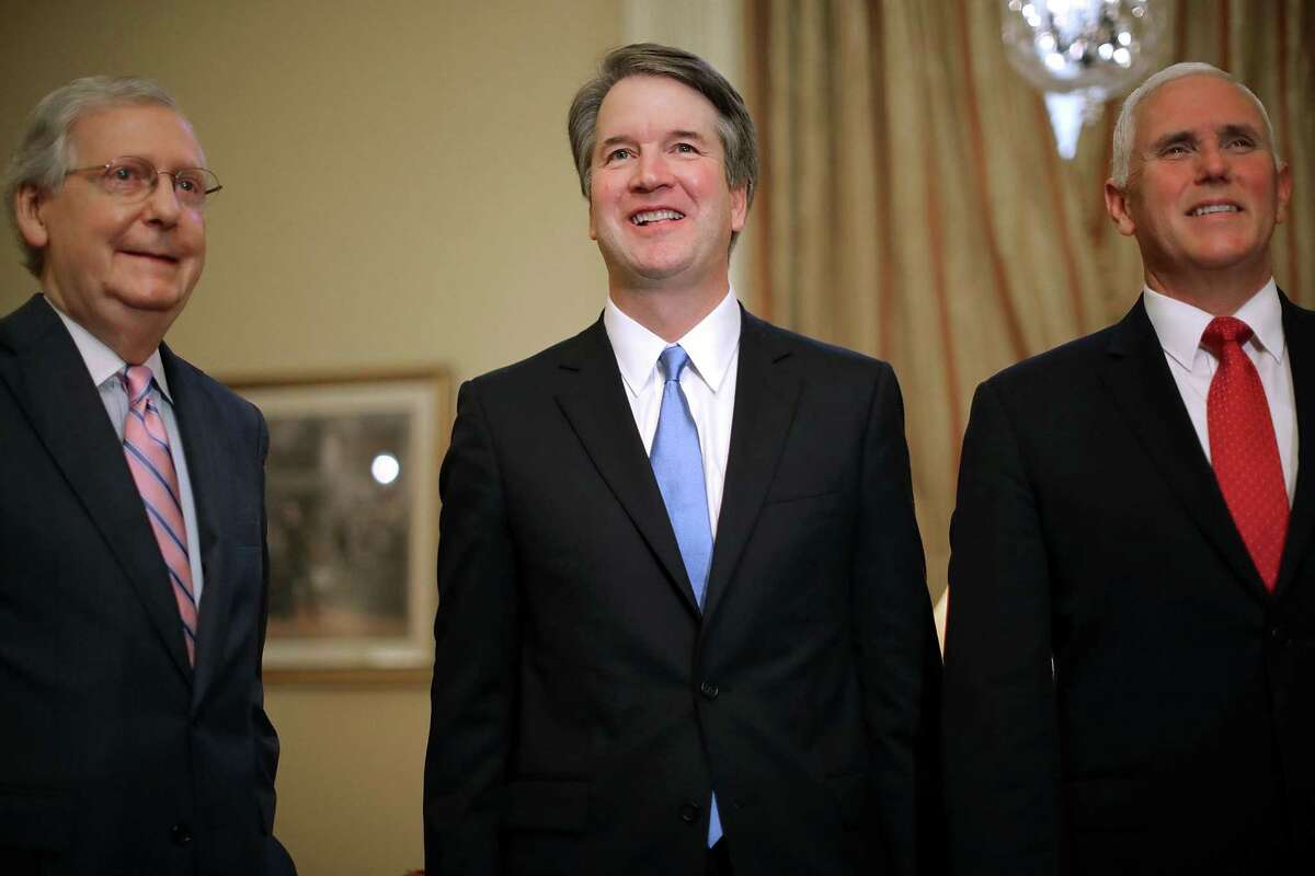 Senate Majority Leader Mitch McConnell, a Republican from Kentucky, from left, Brett Kavanaugh, U.S. Supreme Court associate justice nominee for U.S. President Donald Trump, and U.S. Vice President Mike Pence, stand during a meeting at the U.S. Capitol in Washington, D.C., U.S., on Tuesday, July 10, 2018. Senate Republicans are pledging a swift confirmation process that would put Kavanaugh on the bench before the new term opens Oct. 1, and there is little Democrats can do to stop them.