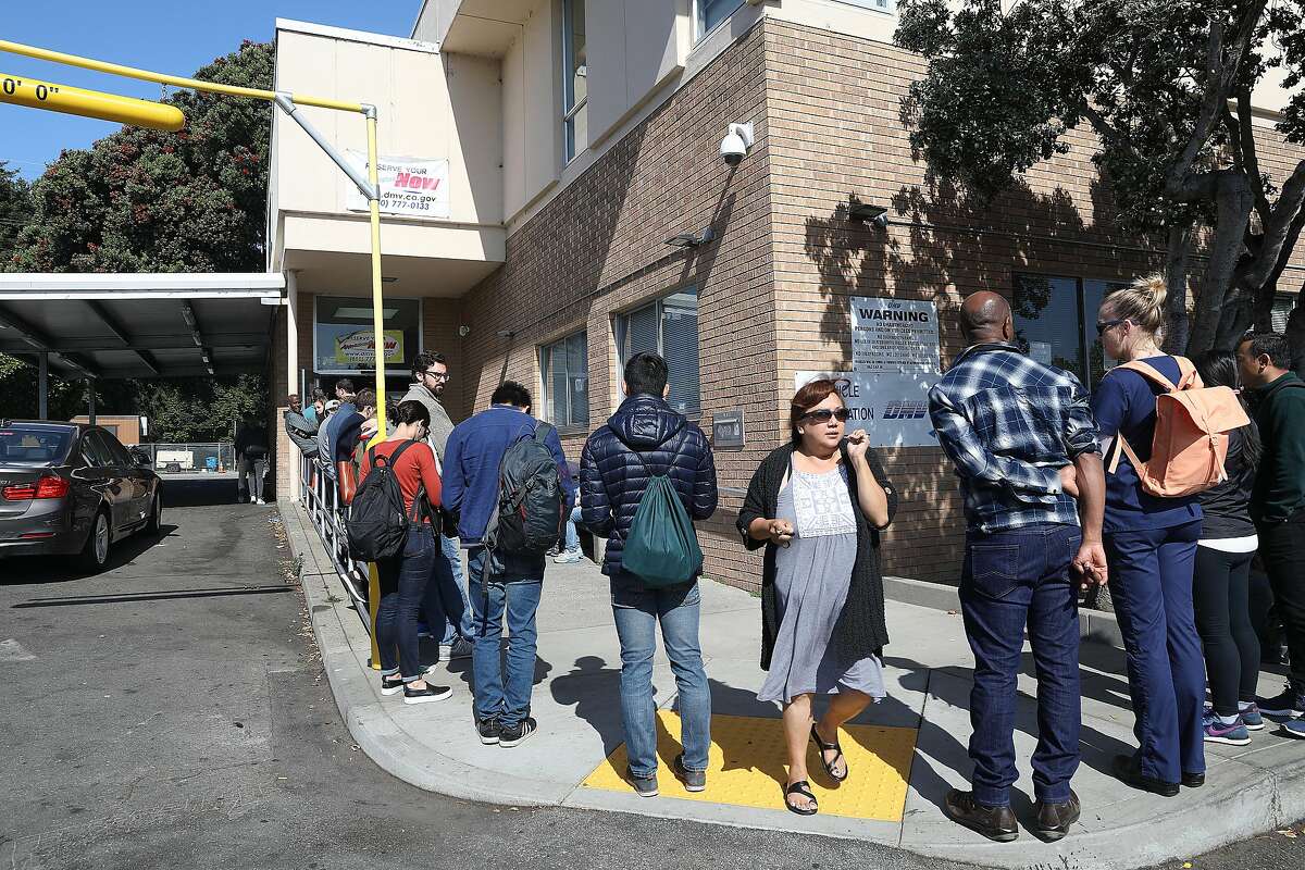 A line for the State Department of Motor Vehicles in July 2018 in San Francisco, Calif. As lines at the DMV are getting longer and appointments harder to schedule, Gov. Gavin Newsom has tackled the agency's problems with a new "strike force" and new director.