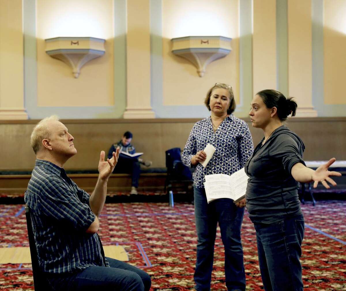 Philip Skinner, as Arkel, and Malin Fritz, as Genevieve, listen to director Keturah Stickann during rehearsal of Debussy's “Pelléas and Mélisande” at Odd Fellows in Berkeley.