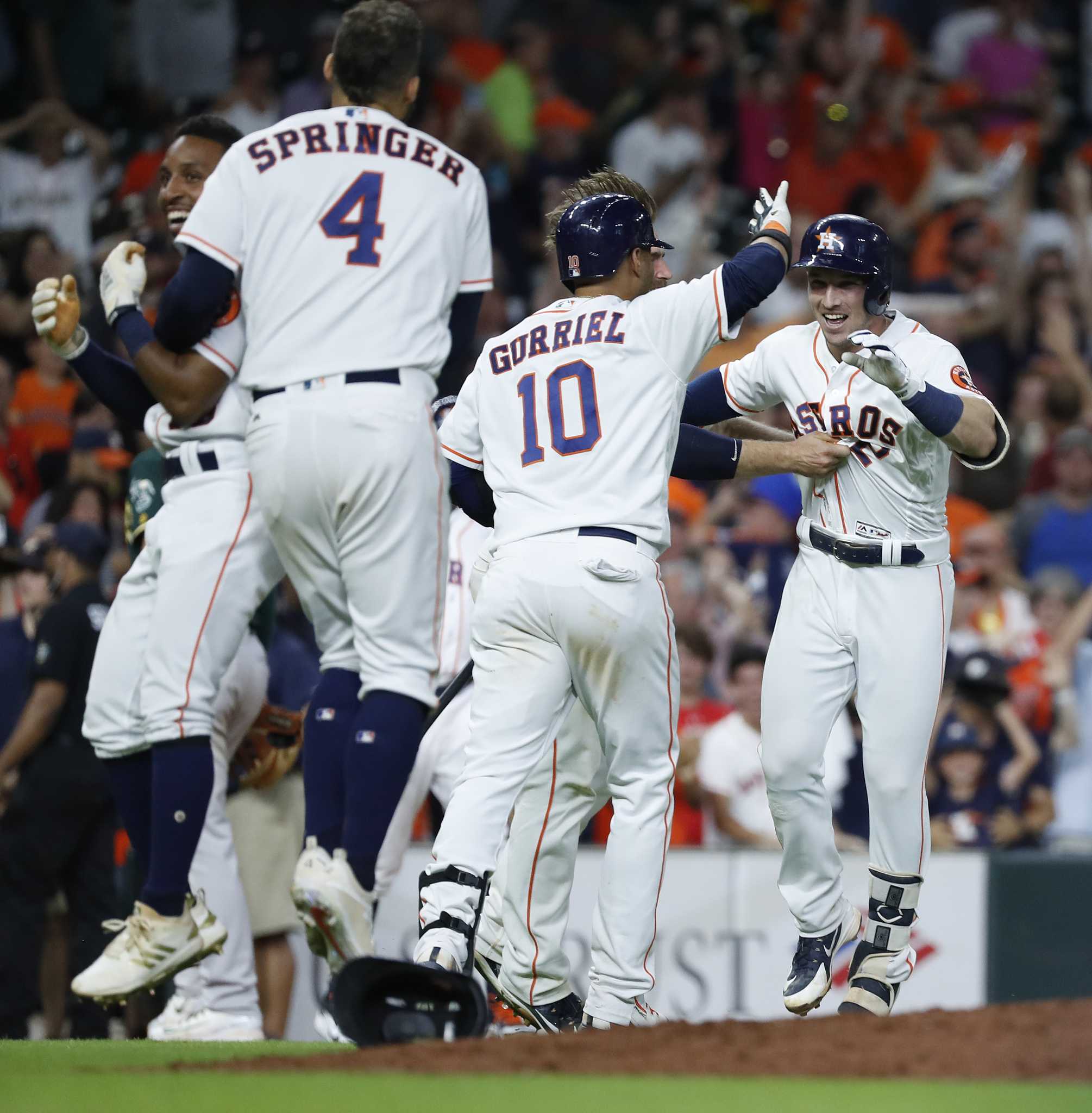 Relive Astros' Alex Bregman's wacky walk-off in photos