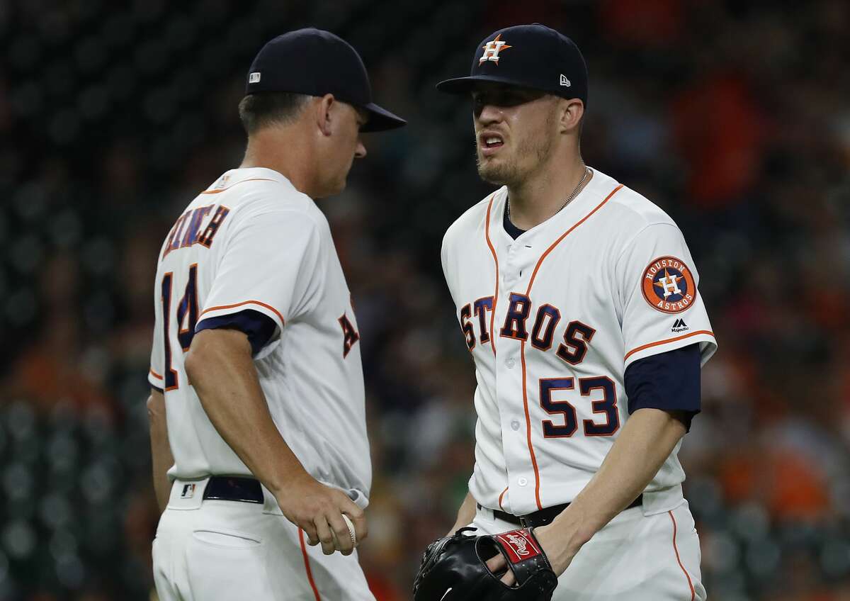 Houston Astros relief pitcher Ken Giles (53) reacts as he hands the ball to manager AJ Hinch as he exited the game during the ninth inning of an MLB game at Minute Maid Park, Tuesday, July 10, 2018, in Houston. ( Karen Warren / Houston Chronicle )