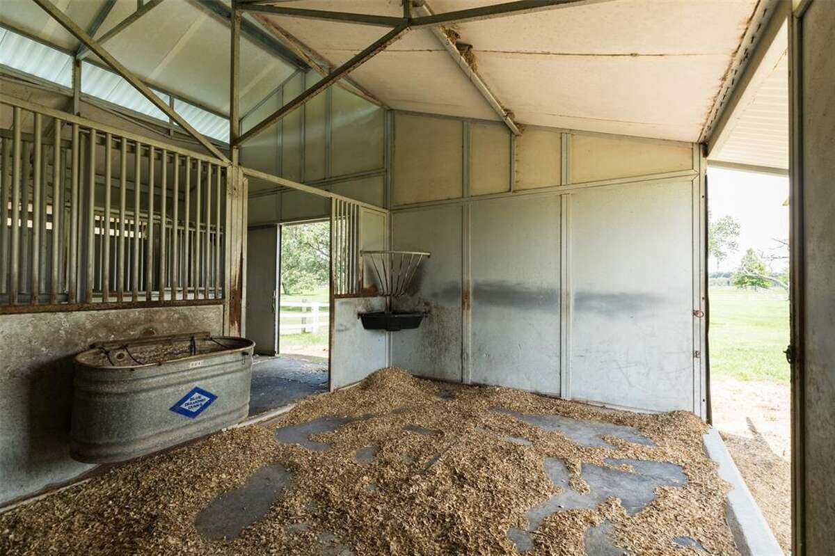 Start your own little village at this Angleton ranch for sale