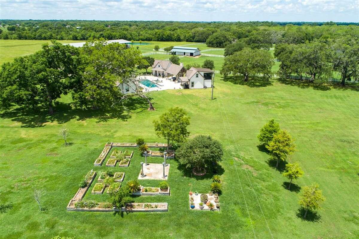 Start your own little village at this Angleton ranch for sale